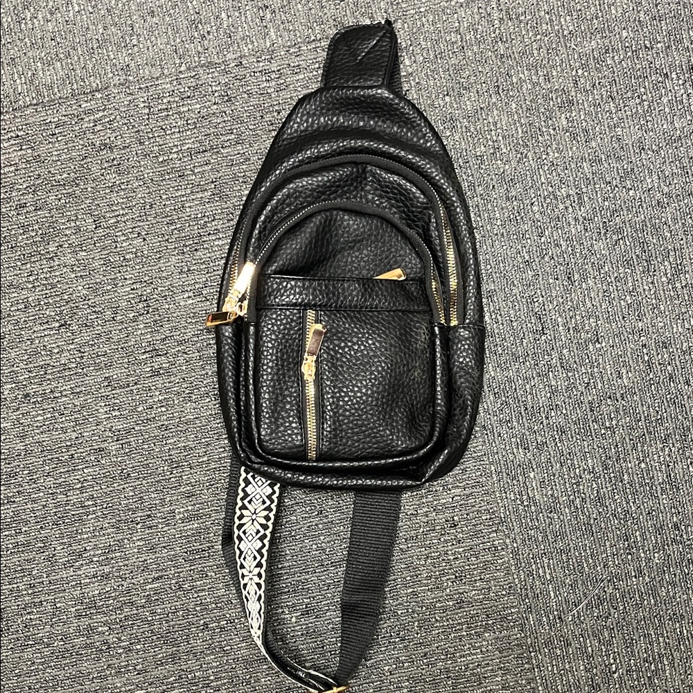 Women’s Black Leather Sling Bag with Gold Hardware